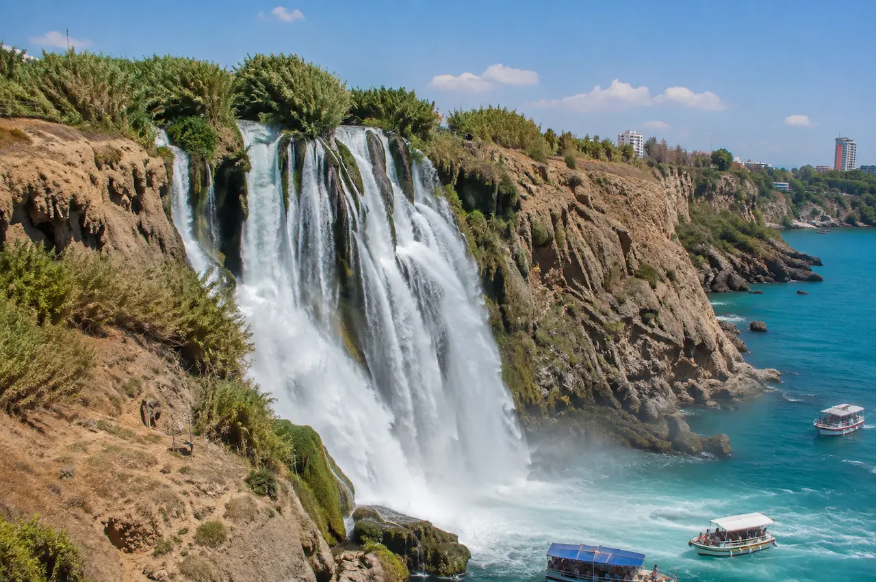 Lower Düden Waterfall cascading from coastal cliffs into the Mediterranean Sea in Antalya.
