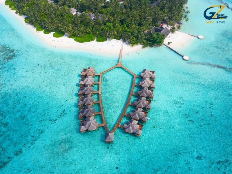 Adaaran Select Meedhupparu Maldives beach villa with white sand and turquoise lagoon