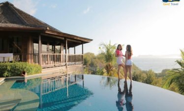 Luxury private pool villa in Ubud Bali surrounded by tropical greenery and rice fields