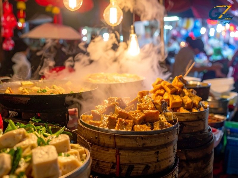 Vibrant Bangkok street food market at night with colorful lights and authentic Thai cuisine stalls
