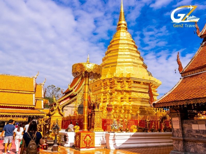 Wat Phra That Doi Suthep temple overlooking Chiang Mai mountains at sunrise