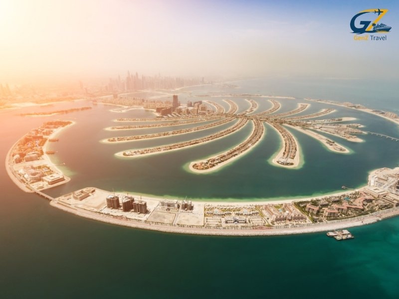 Palm Jumeirah Dubai skyline sunset view with luxury hotels and Arabian Gulf coastline