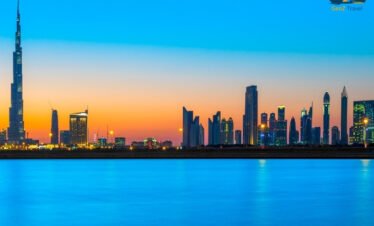 Dubai rooftop infinity pool overlooking skyline and Palm Jumeirah coastline