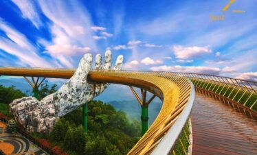 Golden Bridge held by giant hands Ba Na Hills Da Nang Vietnam tour