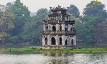 Hoan Kiem Lake and Turtle Tower in Hanoi Vietnam scenic landmark tour