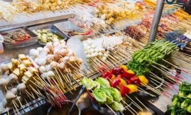 Jalan Alor street food market in Kuala Lumpur with vibrant night atmosphere