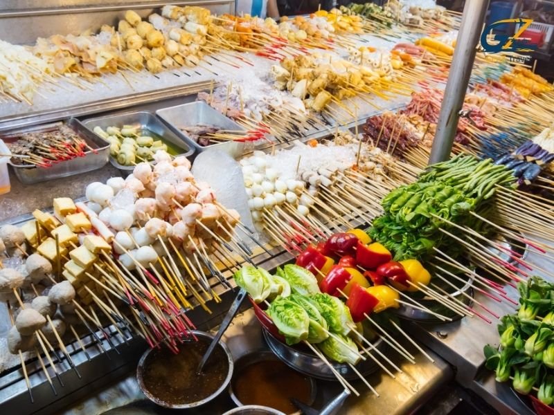 Jalan Alor street food market in Kuala Lumpur with vibrant night atmosphere