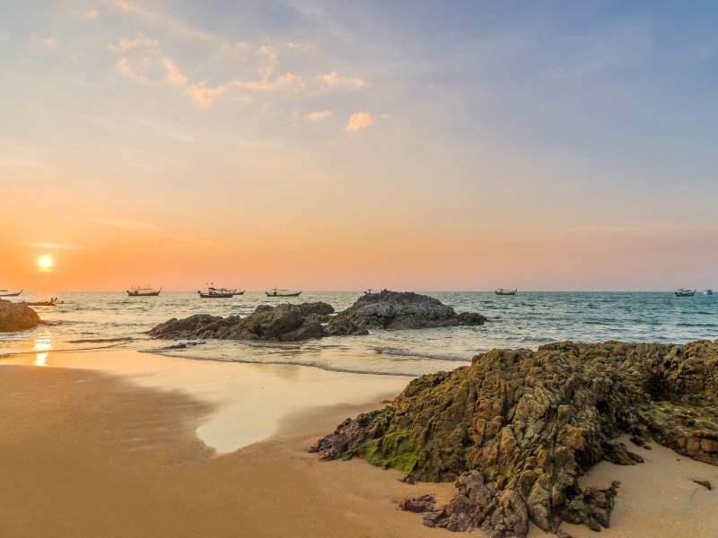 Khao Lak beach with rainforest coastline offering peaceful Thailand luxury holiday escape