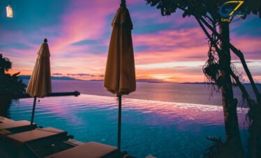 Luxury wooden sea-view villa at Koh Yao Yai overlooking Phang Nga Bay limestone cliffs and calm ocean
