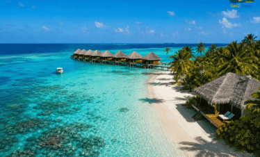 Luxury overwater villas and beach bungalow at Kuredu Island Resort Maldives in the Maldives with turquoise lagoon