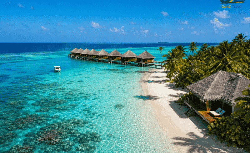 Luxury overwater villas and beach bungalow at Kuredu Island Resort Maldives in the Maldives with turquoise lagoon