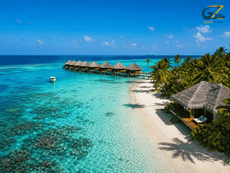 Luxury overwater villas and beach bungalow at Kuredu Island Resort Maldives in the Maldives with turquoise lagoon