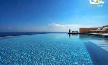 Maldives resort infinity pool overlooking Indian Ocean luxury holiday