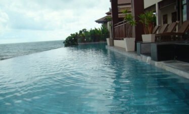 Infinity pool overlooking Indian Ocean at Maldives luxury resort
