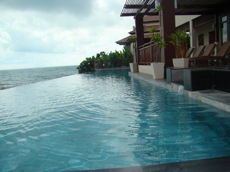 Infinity pool overlooking Indian Ocean at Maldives luxury resort