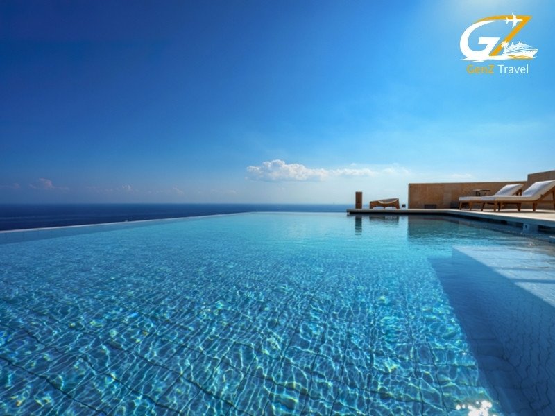 Maldives resort infinity pool overlooking Indian Ocean luxury holiday