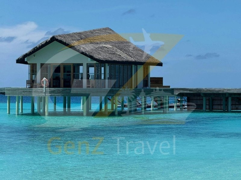 Maldives overwater villas with turquoise lagoon and luxury island resort view from the UK