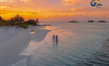 Couple enjoying sunset dhoni cruise in the Maldives twin centre holiday experience