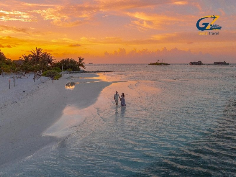 Couple enjoying sunset dhoni cruise in the Maldives twin centre holiday experience