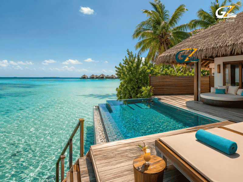 Maldives tour from UK 2026 luxury water villa with private pool and turquoise lagoon view