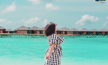 Luxury overwater villa with private pool and slide at Siyam World Maldives in crystal clear lagoon