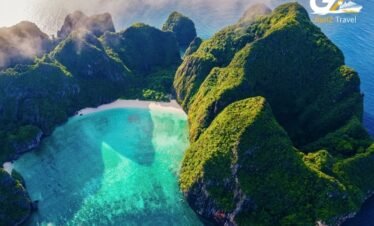 Phi Phi Islands crystal clear water and boats Thailand island hopping tour