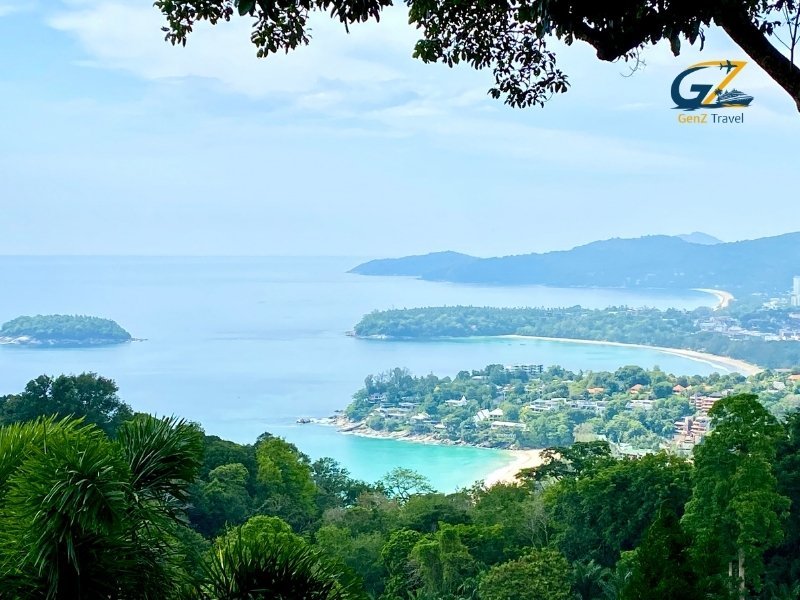 Scenic view of Kata Beach in Phuket with turquoise water, palm trees and luxury tropical resort atmosphere