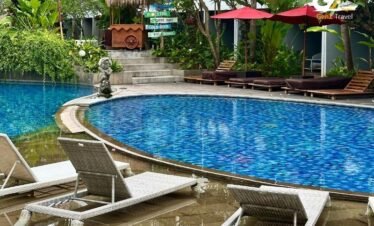 Phuket luxury resort pool view with tropical beach scenery Thailand