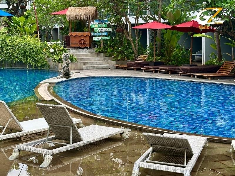 Phuket luxury resort pool view with tropical beach scenery Thailand