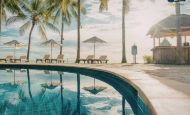 Rixos Saadiyat Island beachfront infinity pool overlooking Arabian Gulf