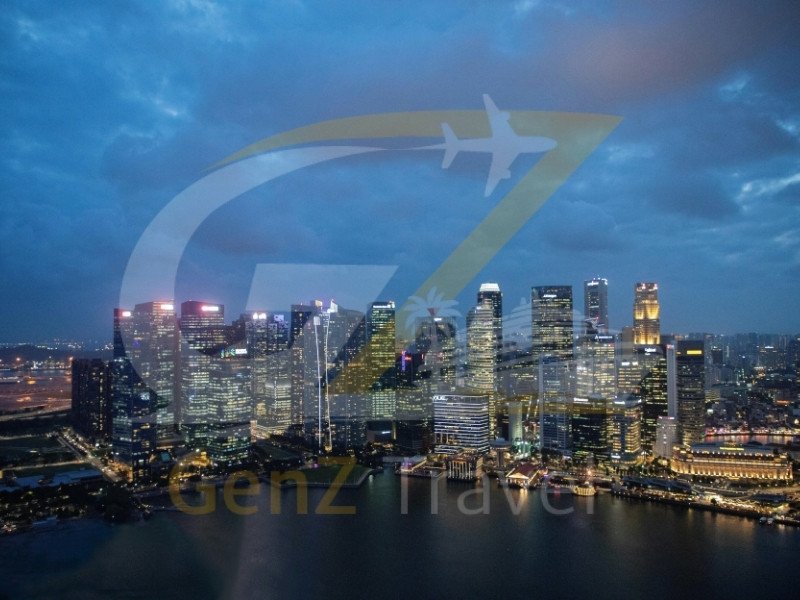 Singapore Marina Bay Sands illuminated skyline at night with city reflections