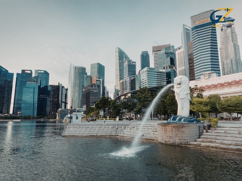 Singapore Marina Bay skyline at night with modern skyscrapers and waterfront lights