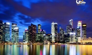 Singapore Marina Bay skyline at night for 12-night Singapore Bali Kuala Lumpur tour package from UK