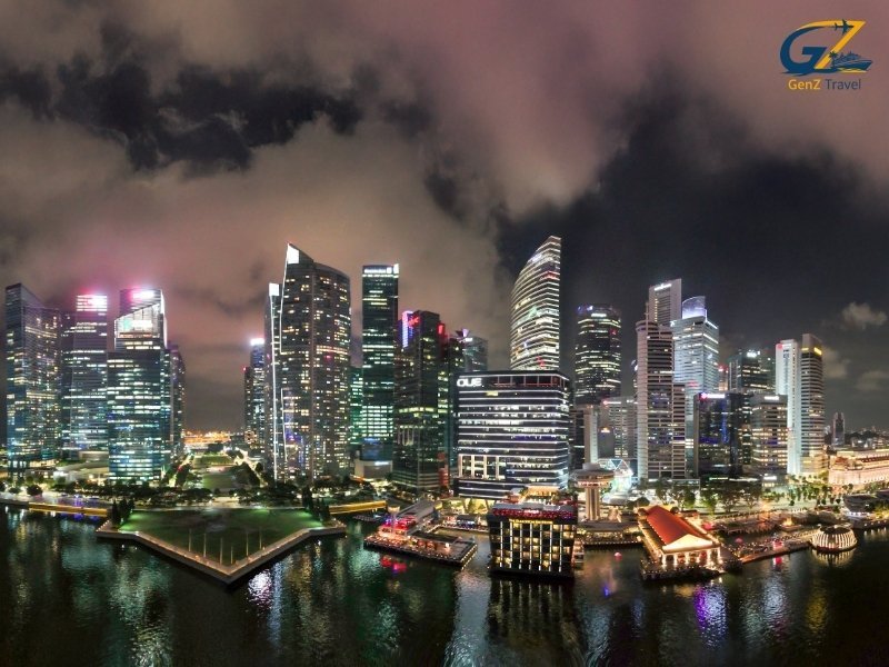 Stunning night view of Marina Bay skyline in Singapore with illuminated skyscrapers and waterfront reflections