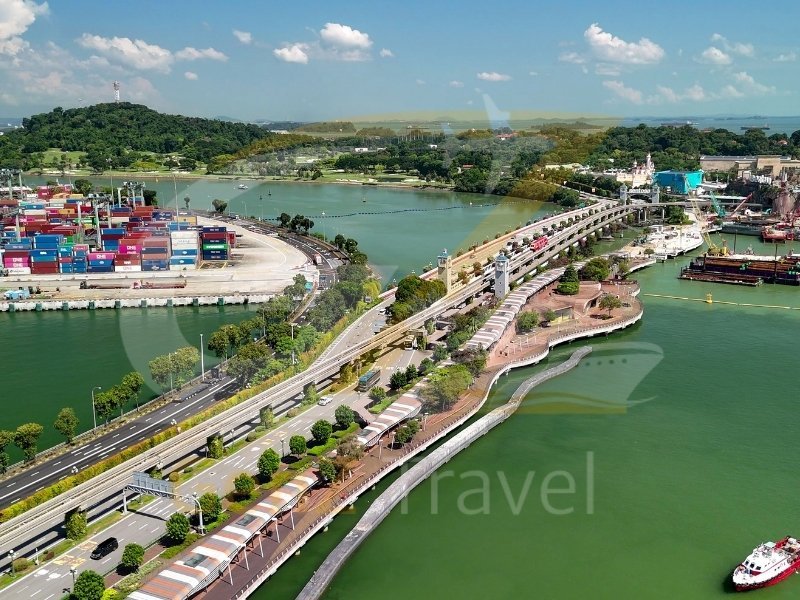 Sentosa Island beach with palm trees, blue water, and luxury resort atmosphere in Singapore
