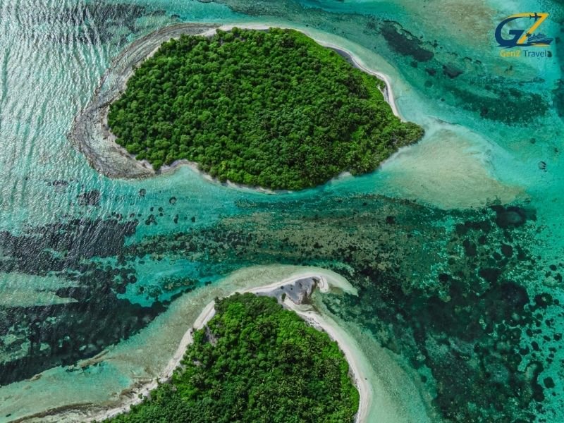 Aerial view of Siyam World Maldives island with white sand beaches and turquoise ocean