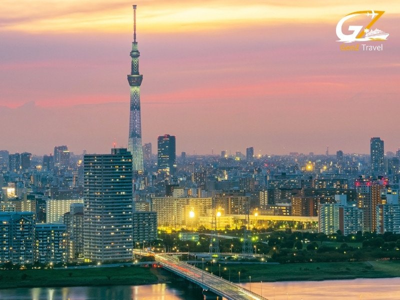 Japan tour 2026 Tokyo Shibuya Crossing night city lights busy intersection