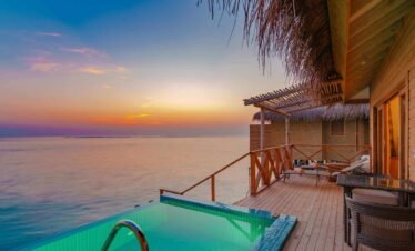 Sunrise Villa terrace at Canareef Resort Maldives with ocean view and private beach access.