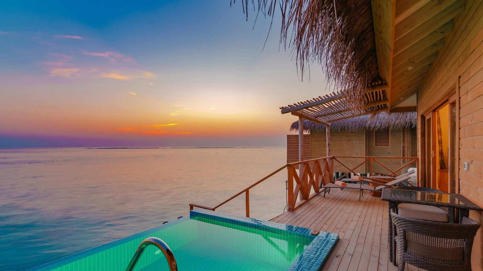 Sunrise Villa terrace at Canareef Resort Maldives with ocean view and private beach access.