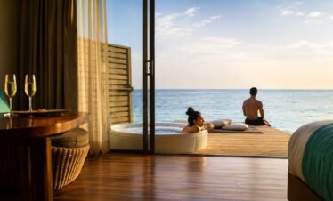 Lagoon villa terrace with private swirl pool and ocean view at Centara Ras Fushi Resort Maldives.