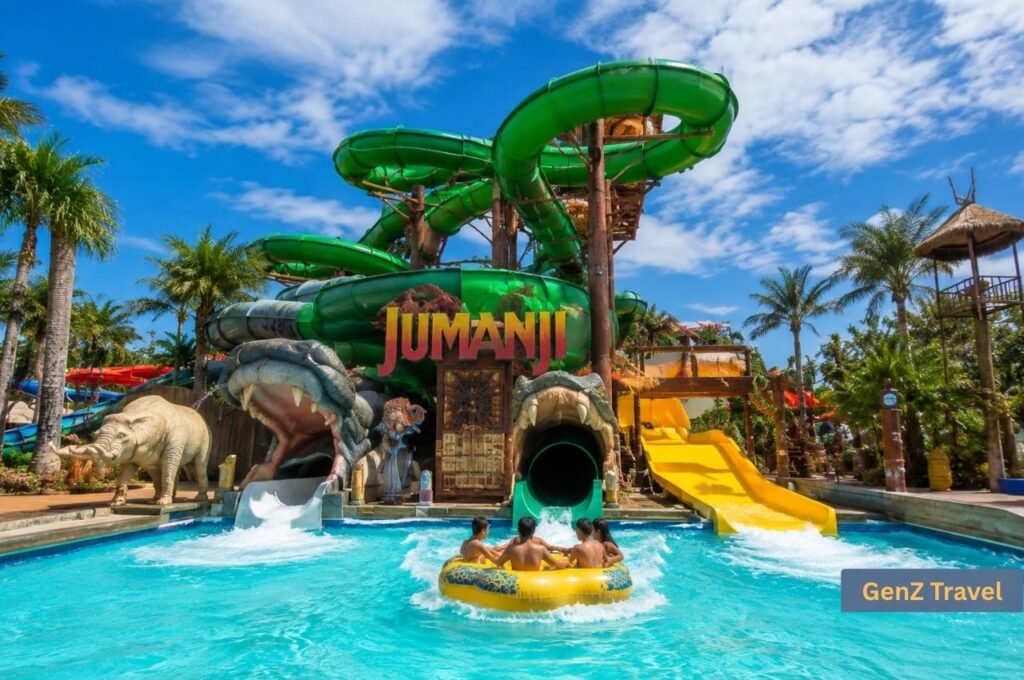 Family riding a raft towards Jumanji-themed slides at Columbia Pictures Aquaverse in Pattaya