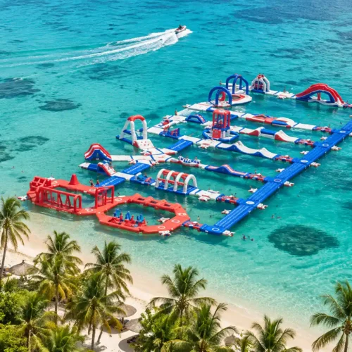 Maldives luxury holiday package with floating water park, turquoise lagoon, white sand beach and tropical island resort
