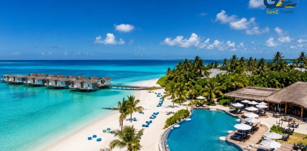 Oblu Xperience Ailafushi resort with turquoise lagoon, overwater villas, white-sand beach and beachfront swimming pool in the Maldives.