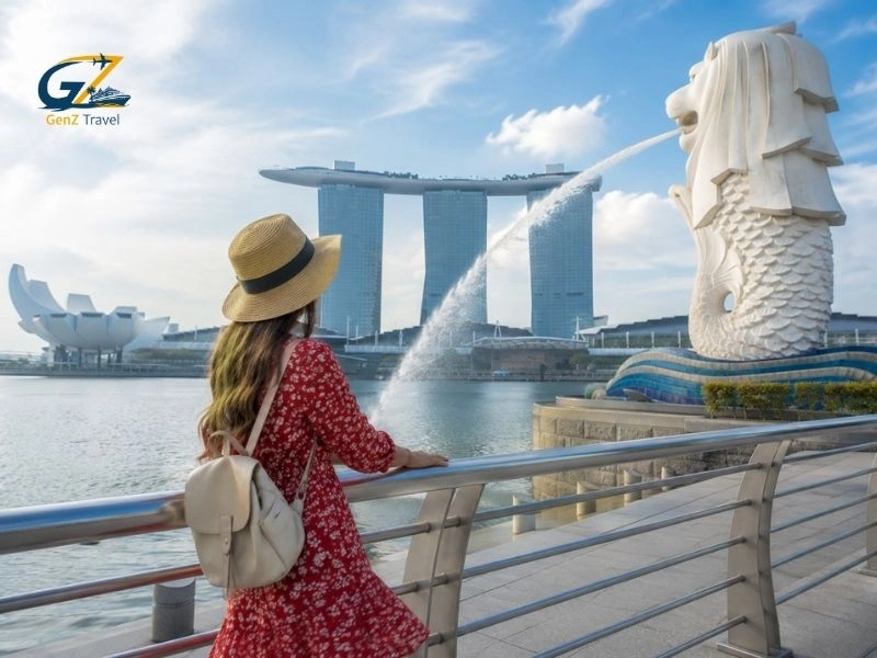 Female traveller at Merlion Park overlooking Marina Bay Sands, one of the best places to go in Singapore