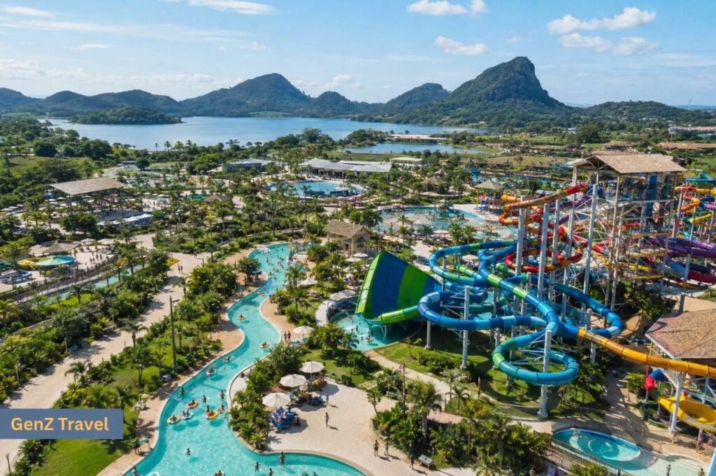 Aerial view of Ramayana Water Park with twisting slides, a lazy river and mountains near Pattaya