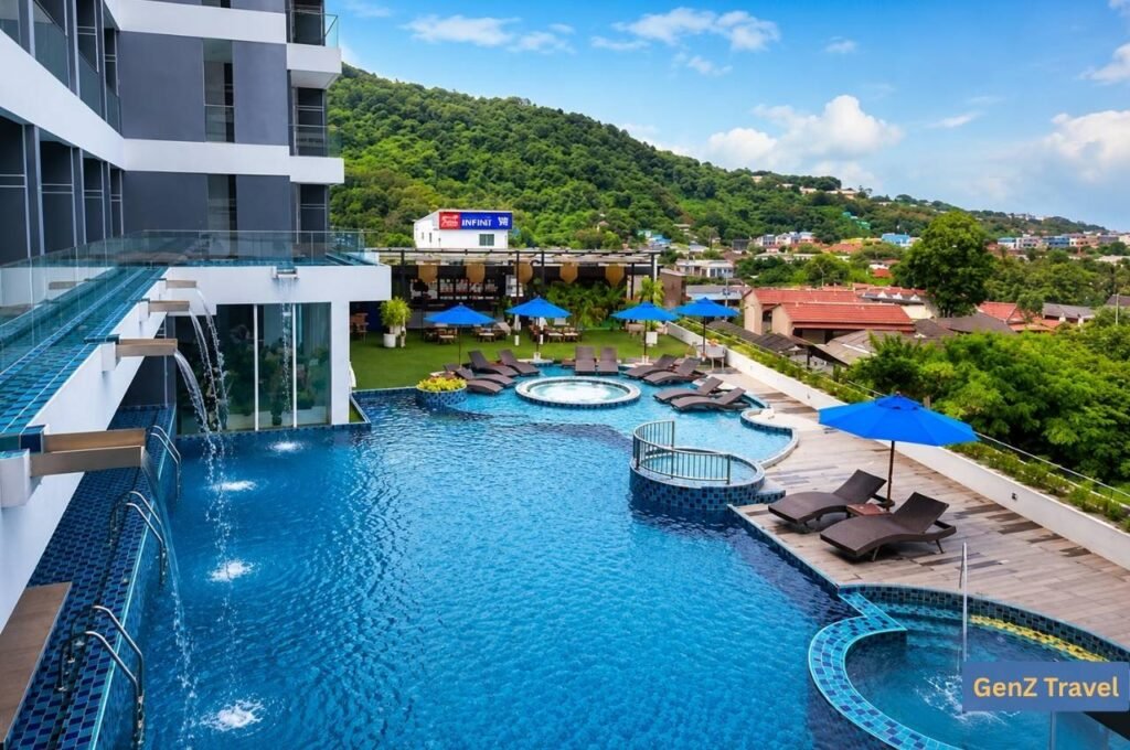 The Yama Hotel Phuket pool with hillside views over Kata