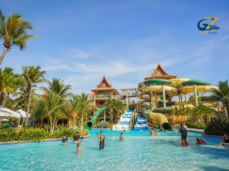 Families enjoying colourful slides and pools at one of the best water parks in Thailand