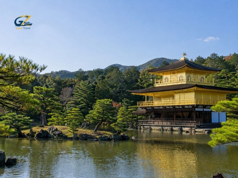 Kinkaku-ji Golden Pavilion in Kyoto reflected in a peaceful pond surrounded by Japanese gardens