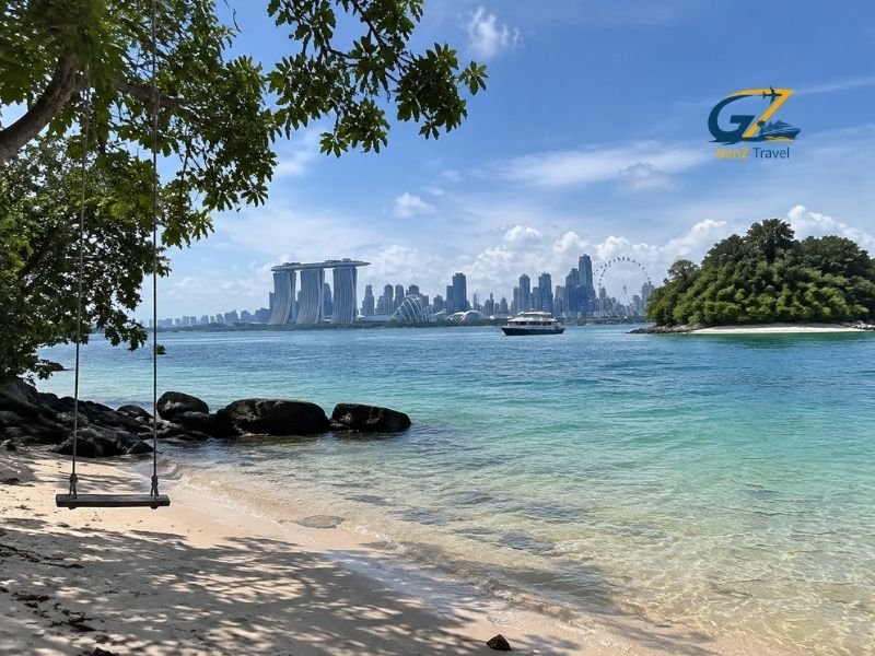 Islands near Singapore with tropical beach, turquoise waters and Singapore skyline views