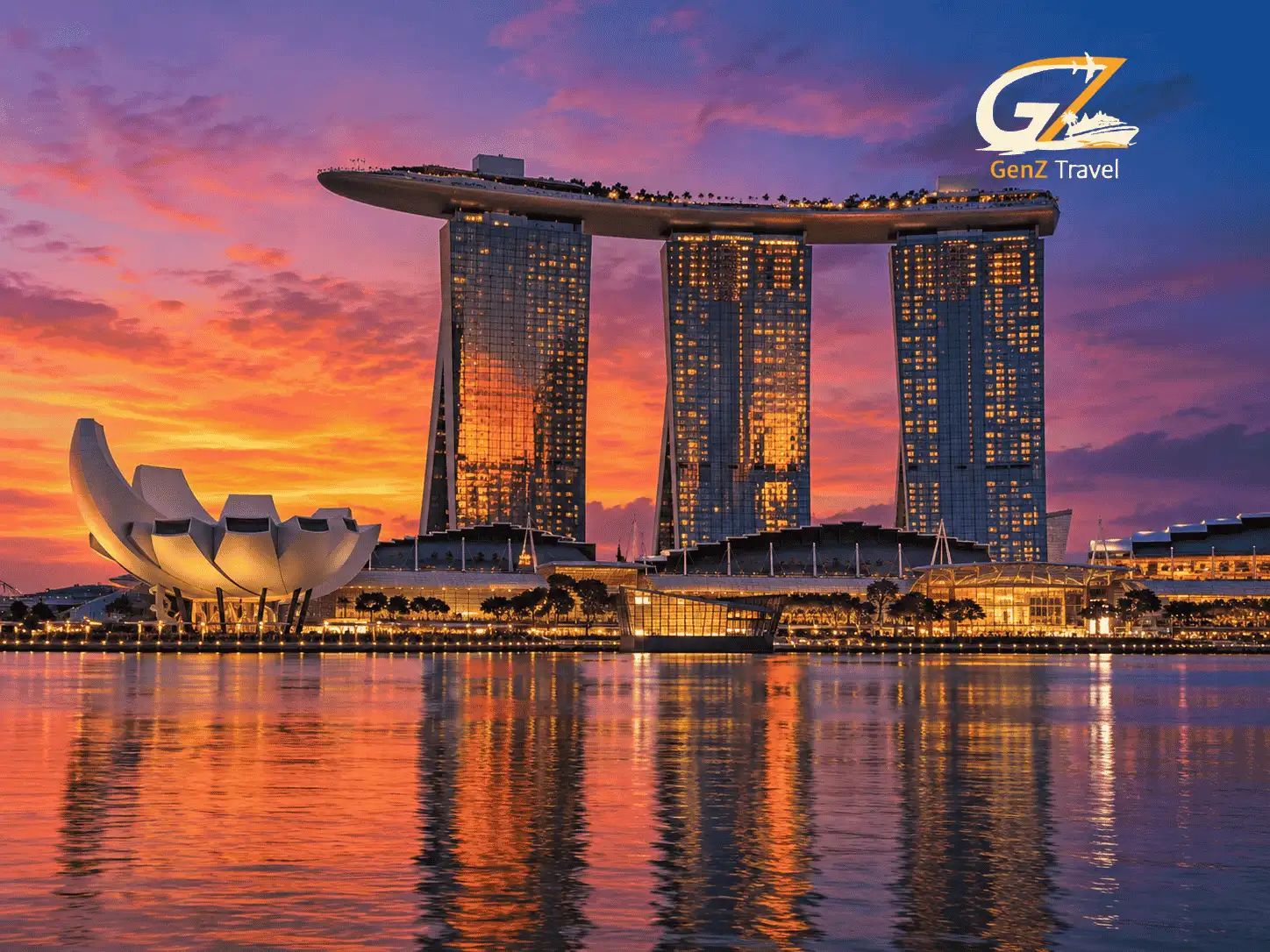 Marina Bay Sands at sunset, one of the top luxury hotels Singapore offers, with the ArtScience Museum beside the bay